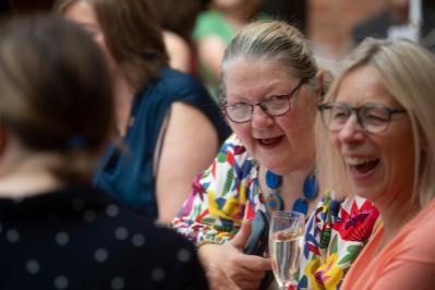 two ladies laughing